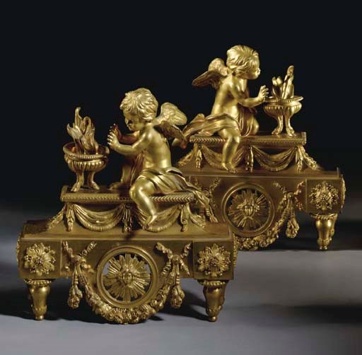A PAIR OF LOUIS XVI ORMOLU CHENETS