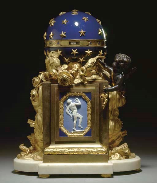 A LOUIS XVI ORMOLU, WHITE MARBLE, PATINATED BRONZE, ENAMEL AND PORCELAIN PENDULE A CERCLE TOURNANT