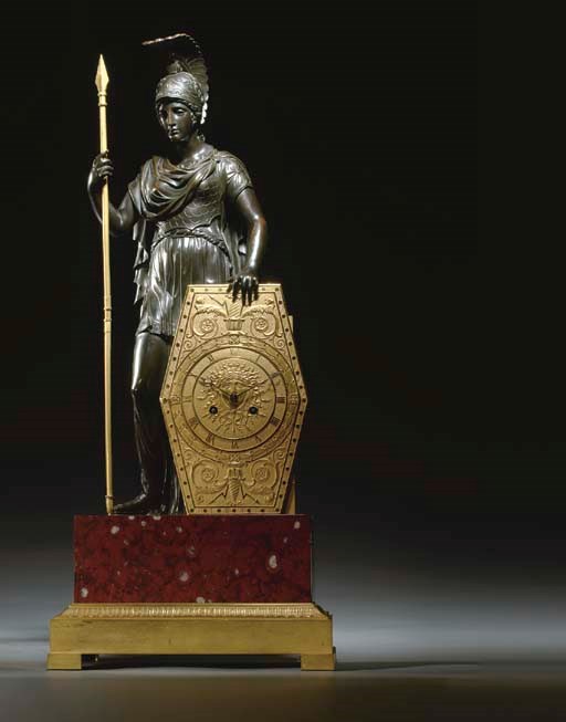 AN EMPIRE ORMOLU PATINATED BRONZE AND GRIOTTE MARBLE MANTEL CLOCK