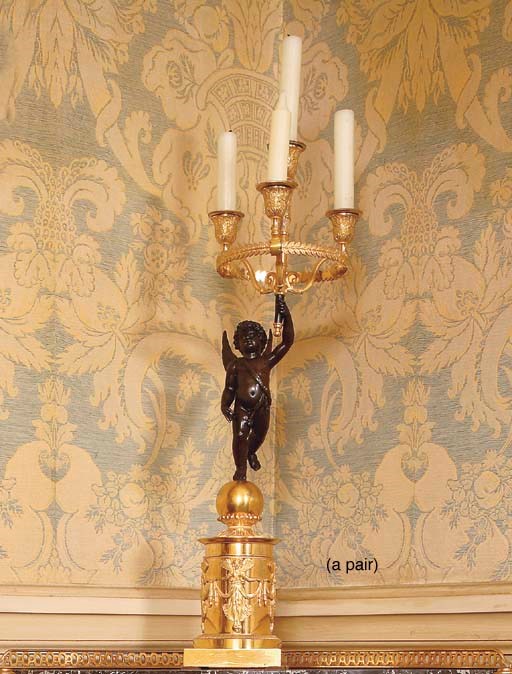 A PAIR OF CHARLES X ORMOLU FOUR-BRANCH CANDELABRA