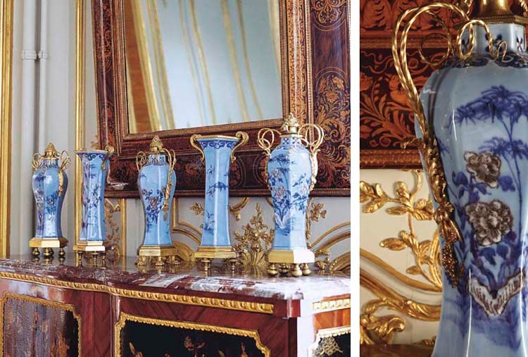 A MATCHED GARNITURE OF ORMOLU-MOUNTED CHINESE PORCELAIN VASES