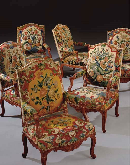 A SET OF SIX REGENCE BEECHWOOD AND FLORAL NEEDLEWORK FAUTEUILS