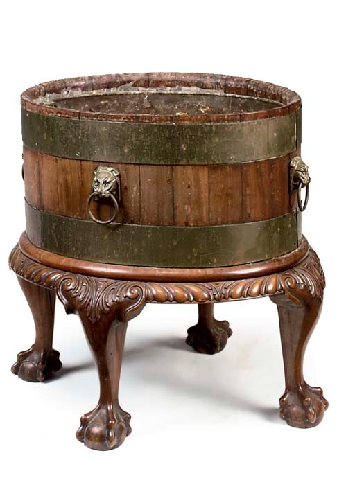 A MAHOGANY AND BRASS BOUND WINE COOLER