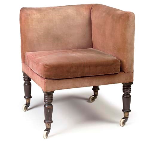 A VICTORIAN MAHOGANY FRAMED CORNER ARMCHAIR