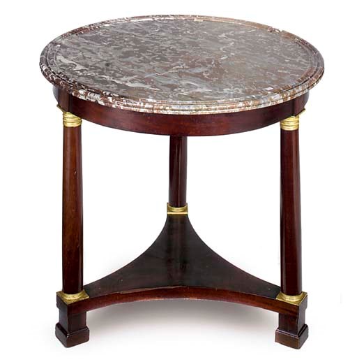 A FRENCH GILT METAL MOUNTED MAHOGANY GUERIDON