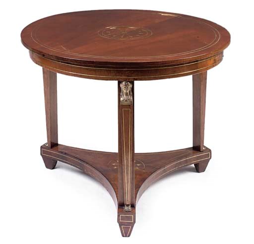 A NORTH EUROPEAN MAHOGANY AND BRASS MOUNTED CENTRE TABLE