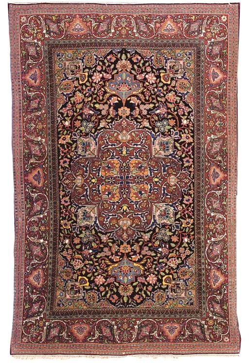 A PAIR OF ISFAHAN RUGS