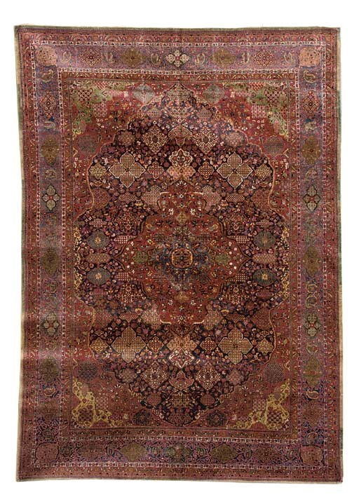 A SILK KASHAN CARPET