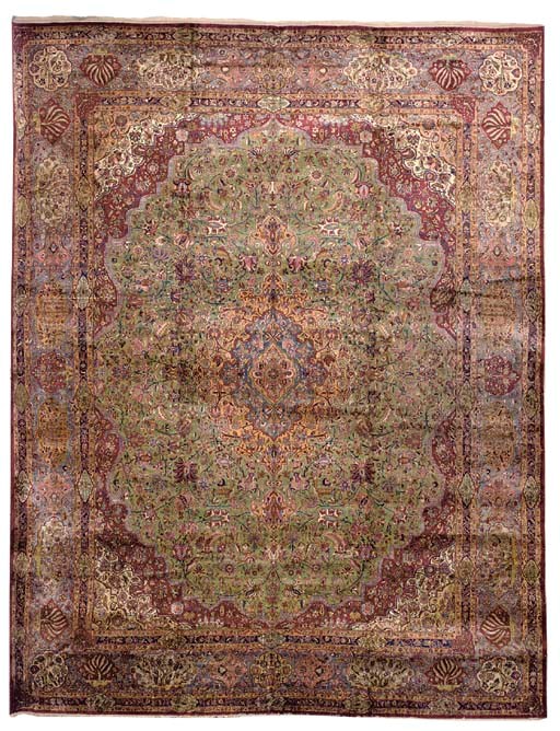 A SILK KASHAN CARPET