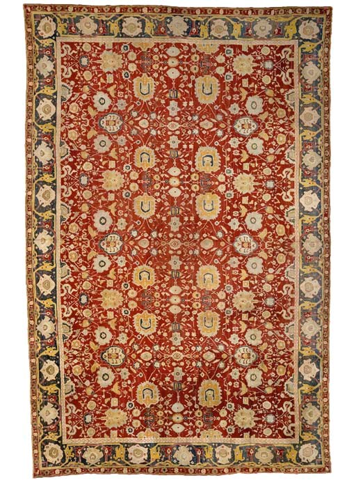 A LARGE AGRA CARPET