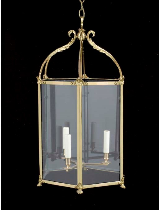 A GEORGE III-STYLE POLISHED BRASS HEXAGONAL-FORM HALL LANTERN,
