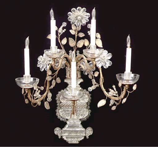 A PAIR OF MAISON BAGUES GILT METAL GLASS AND ROCK CRYSTAL FIVE LIGHT WALL APPLIQUES,
