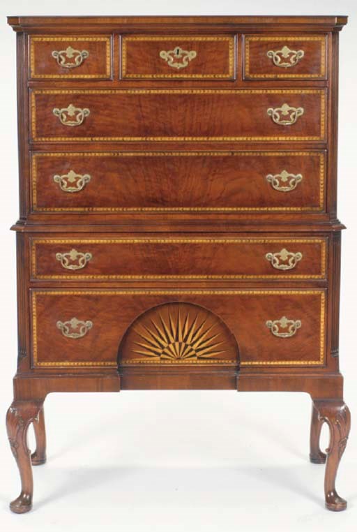 A CHIPPENDALE STYLE WALNUT INLAID CHEST ON STAND,