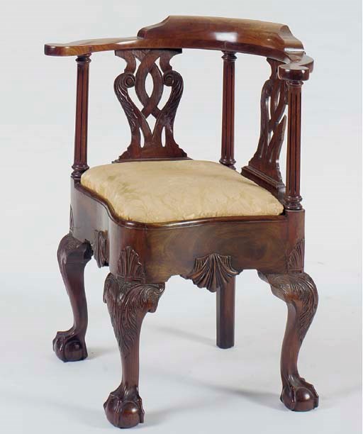 AN AMERICAN COLONIAL REVIVAL MAHOGANY CORNER CHAIR,