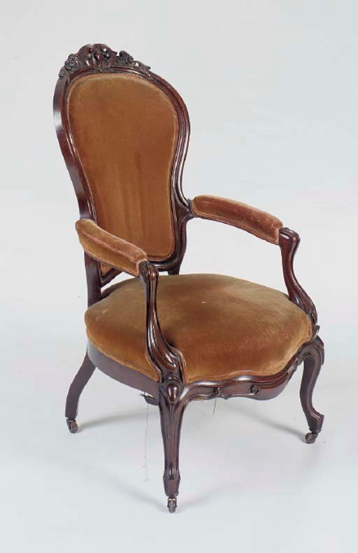 A VICTORIAN CARVED MAHOGANY OPEN ARMCHAIR,