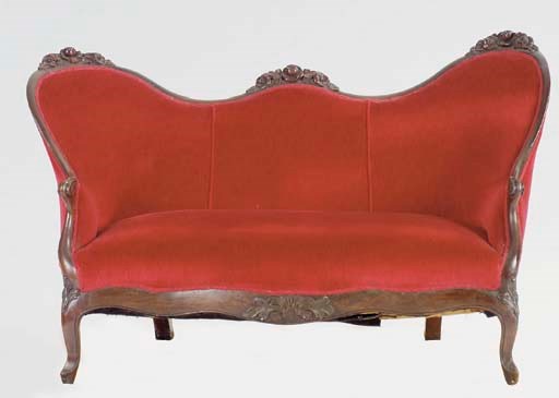 AN AMERICAN CARVED MAHOGANY SETTEE,