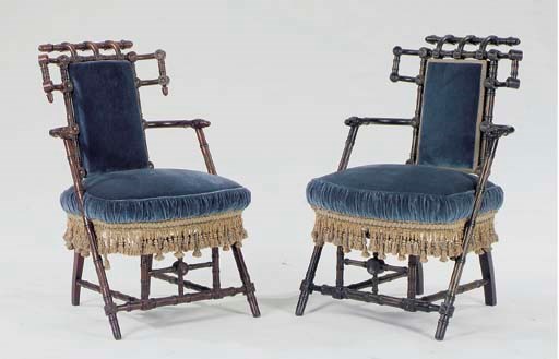 A MATCHED PAIR OF AMERICAN AESTHECTIC MOVEMENT ARMCHAIRS,