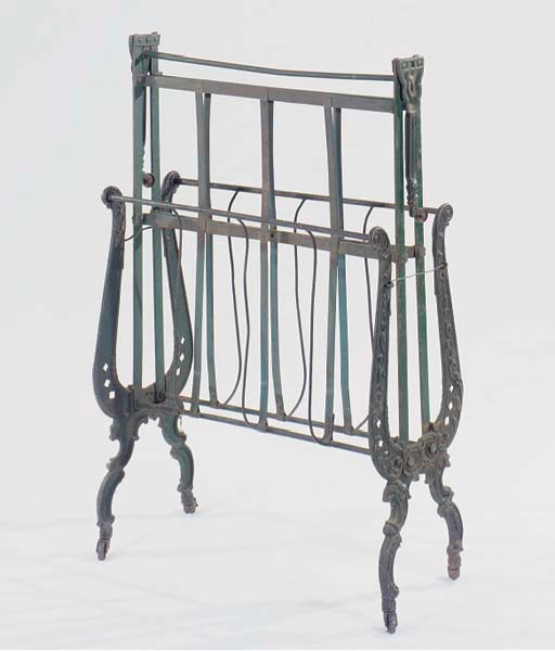 AN AMERICAN GREEN PAINTED CAST IRON FOLDING DAY BED,