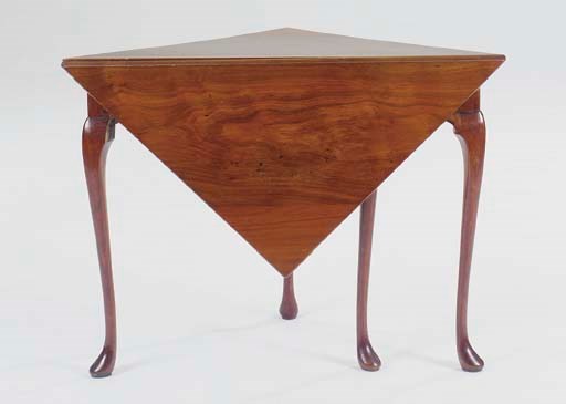AN ENGLISH WALNUT ENVELOPE TABLE,