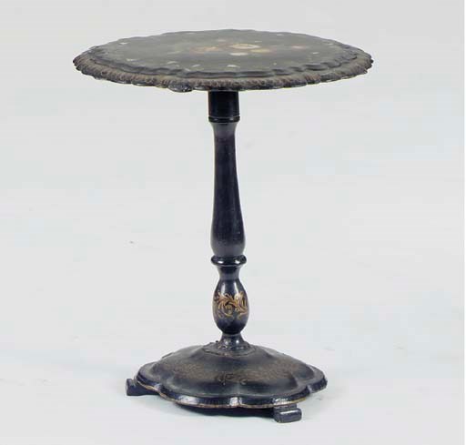 AN ENGLISH PAPIER MACHE CIRCULAR TILT TOP TABLE,