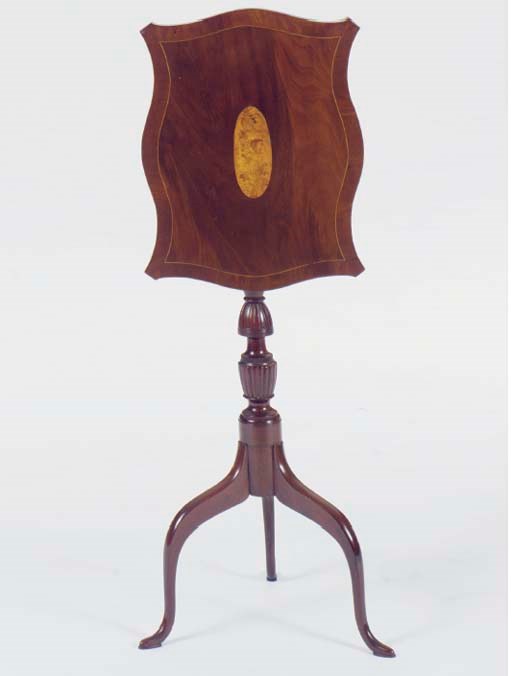 A FEDERAL MAHOGANY AND MAPLE TILT TOP CANDLESTAND,