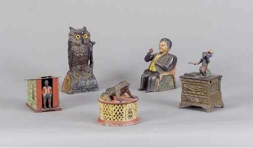 A GROUP OF FIVE PAINTED CAST IRON MECHANICAL MONEY BANKS,