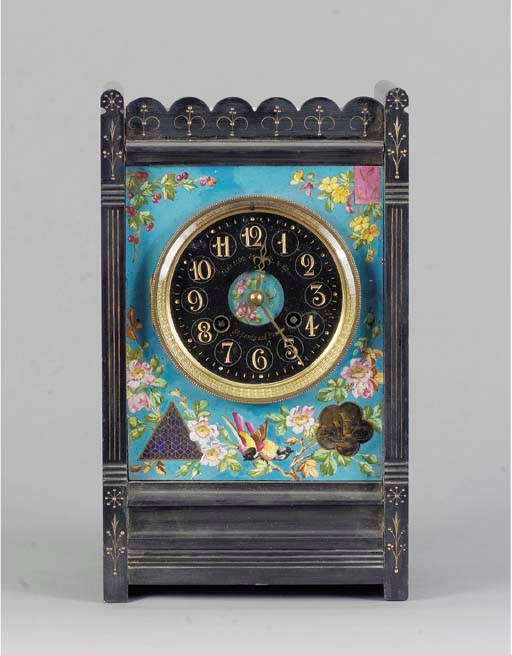 AN AMERICAN ENAMELLED AND EBONISED ASTHETIC MOVEMENT MANTEL CLOCK,