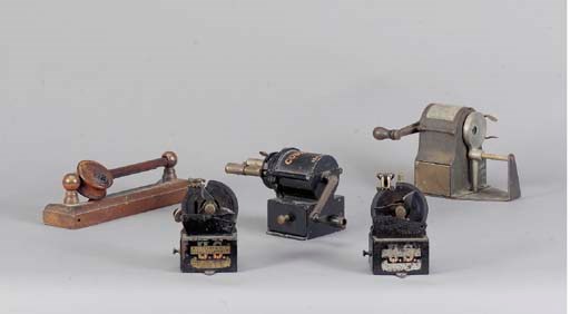 A GROUP OF SEVEN VINTAGE AMERICAN PENCIL SHARPENERS,