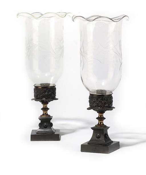A PAIR OF REGENCY BRONZE STORM LAMPS