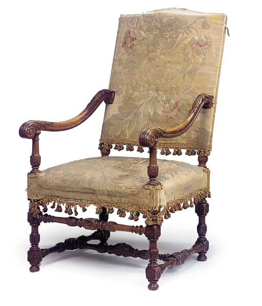 A FLEMISH WALNUT ARMCHAIR