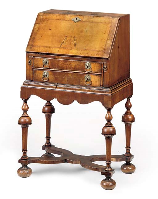 A WALNUT BUREAU ON STAND