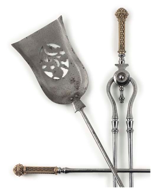A SET OF THREE STEEL AND GILT BRASS FIRE IRONS