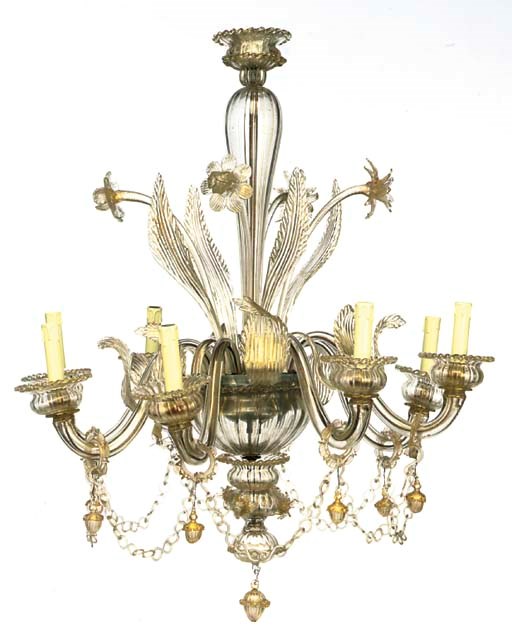 A VENETAIN GLASS AND GILT-HEIGHTENED EIGHT-LIGHT CHANDELIER