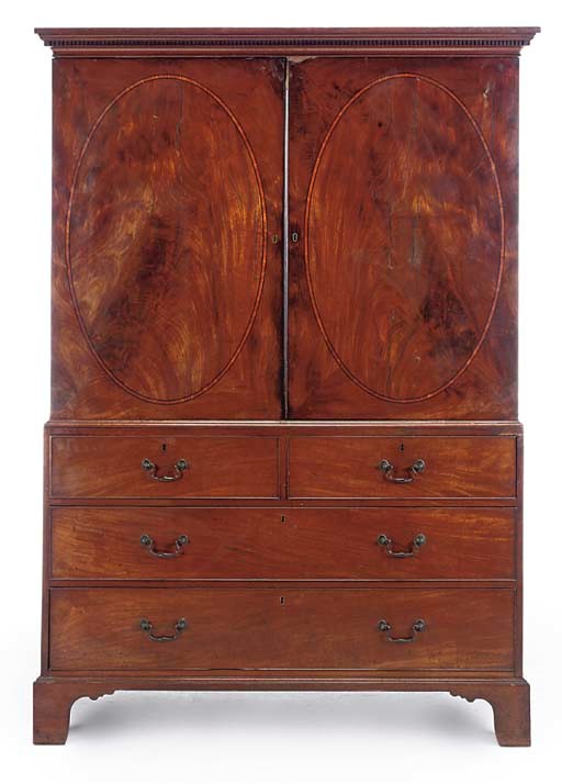 A GEORGE III MAHOGANY LINEN PRESS