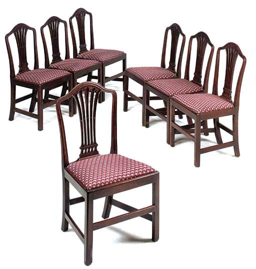 A SET OF SEVEN GEORGE III MAHOGANY DINING CHAIRS
