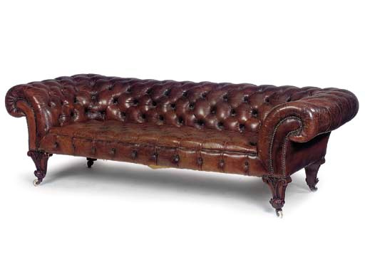 AN EARLY VICTORIAN WALNUT CHESTERFIELD SOFA