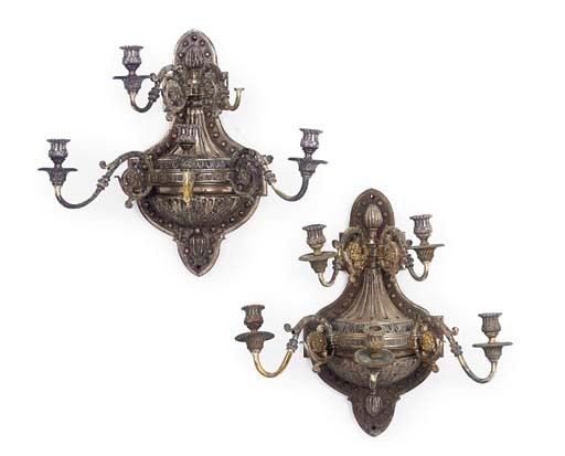 A PAIR OF SILVERED BRASS FIVE BRANCH WALL LIGHTS