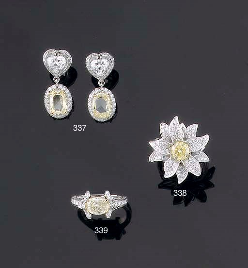 A COLOURED DIAMOND DRESS RING