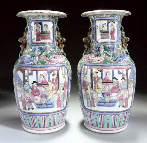 A pair of famille rose Cantonese vases, 19th Century
