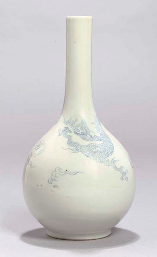 A Chinese white glazed bottle vase, Kangxi