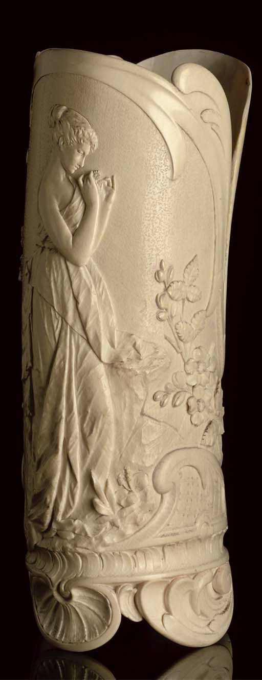 A CONTINENTAL RELIEF-CARVED IVORY VASE