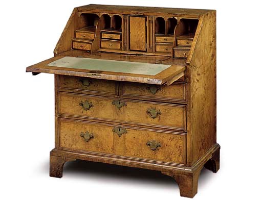 A GEORGE I BURR ASH AND FEATHERBANDED BUREAU