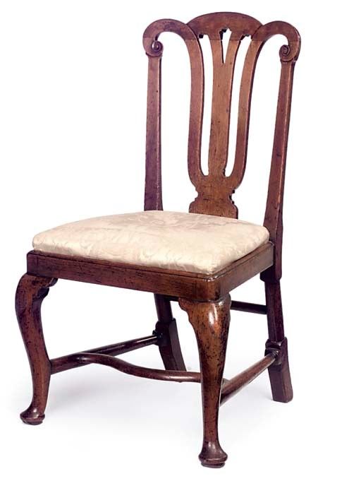 A GEORGE I WALNUT SIDE CHAIR