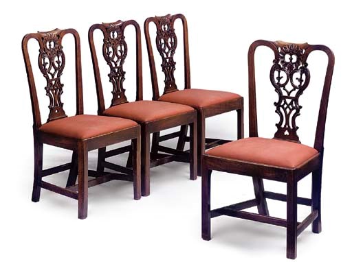 A SET OF FOUR GEORGE III MAHOGANY DINING CHAIRS