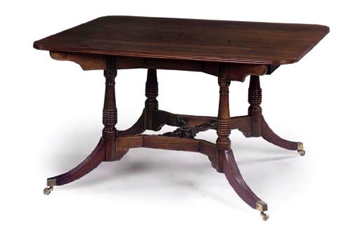 A GEORGE III MAHOGANY CUMBERLAND-ACTION DINING-TABLE