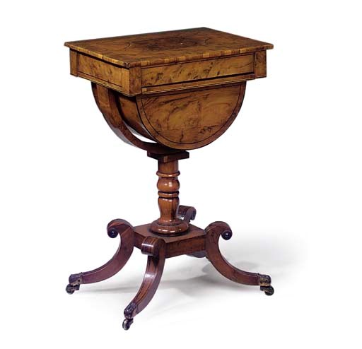 A REGENCY YEWWOOD AND ROSEWOOD CROSSBANDED WORK TABLE