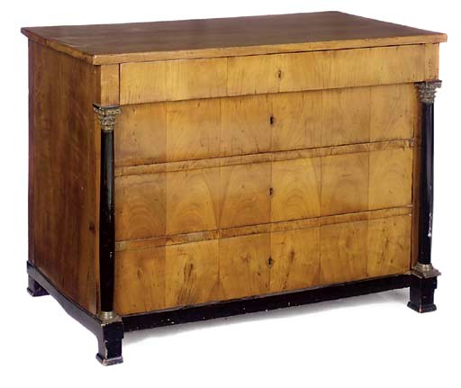 A NORTH ITALIAN OR AUSTRIAN BIEDERMEIER FRUITWOOD AND EBONISED COMMODE