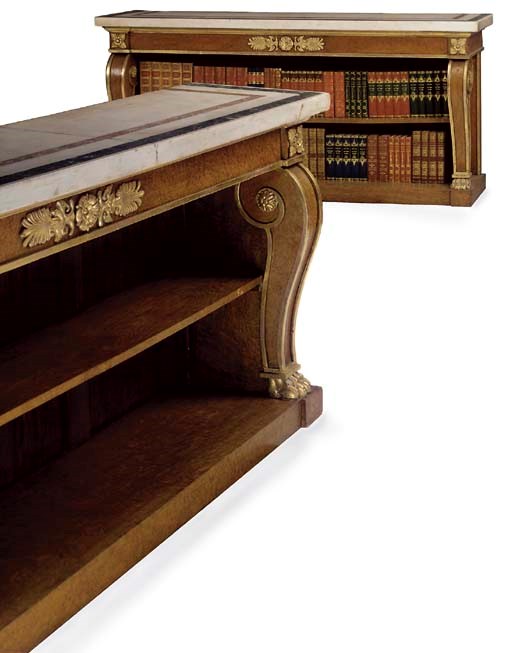 A PAIR OF REGENCY BURR ELM AND PARCEL GILT OPEN BOOKCASES