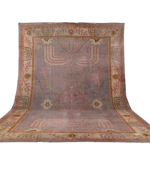 A DONEGAL ARTS AND CRAFTS CARPET