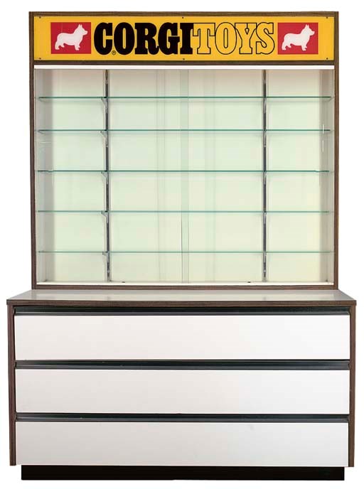 A Large Corgi Retail Display Cabinet Constructed of Wood Grain Formica